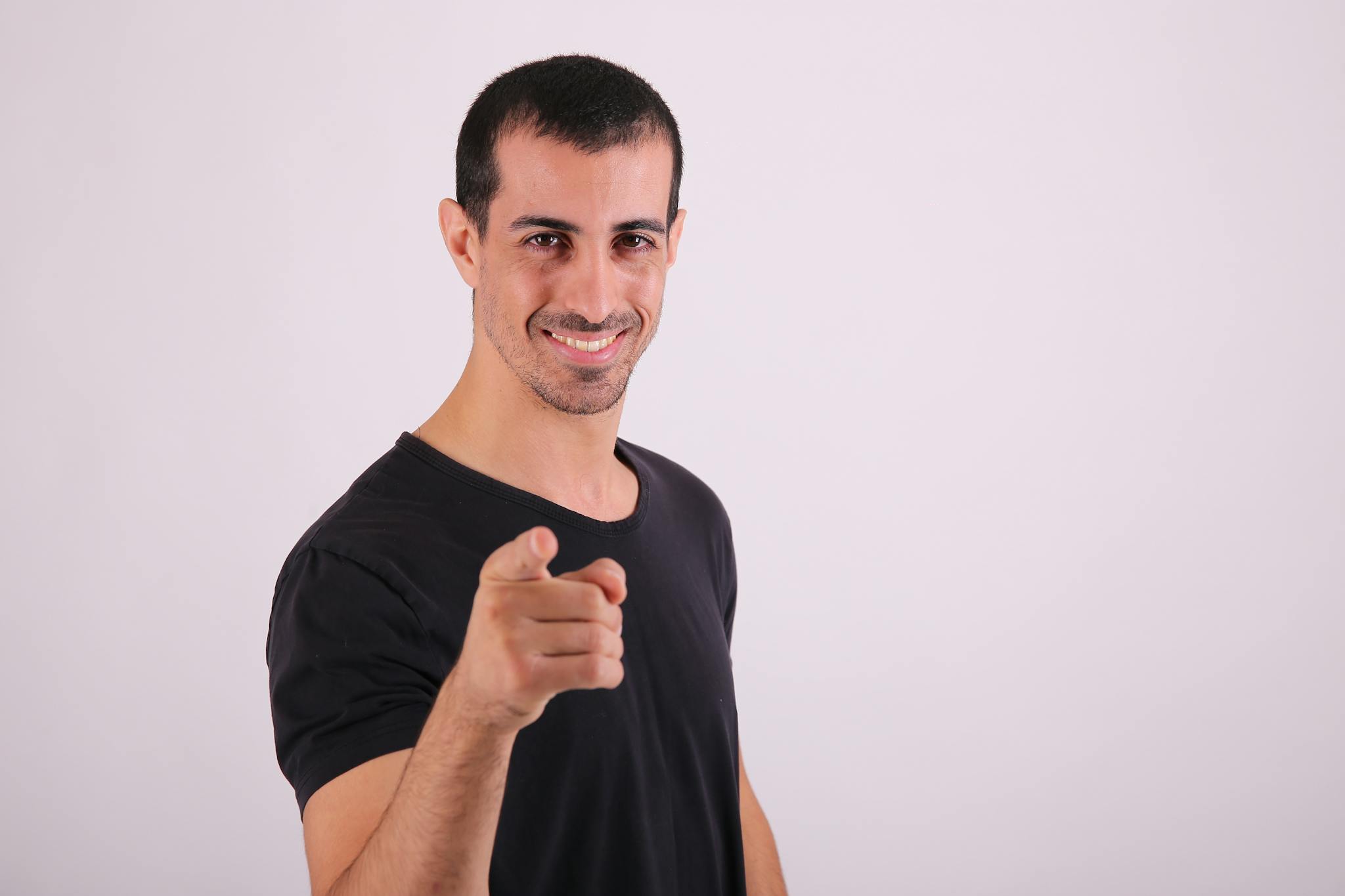 Man pointing at camera with his finger